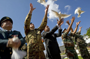 Releasing doves at the end of the ceremony marking International Day of Peace