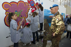 UNIFIL Head of Mission and Force Commander Major-General Luciano Portolano speaking with the students involved in the ‘Painting for Peace’ activity at UNIFIL HQ